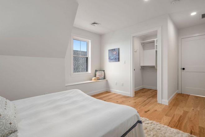 Bedroom with closet and window bench - Private Bedroom available in NEW, Oversized 3 Bedroom Condo near Ball Station/Tufts (Female-only)