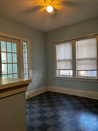 Bedroom/sunroom - Ashland/Moore Unit- Beautiful and Historic 1+ Bedroom Apartments