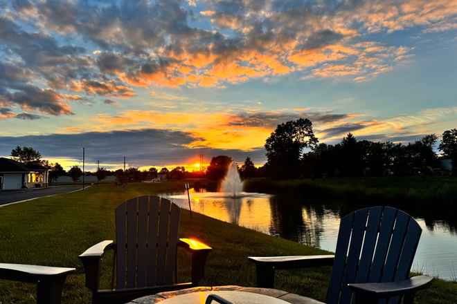 sunset view by the pond - WESTRIDGE FLATS Apartments