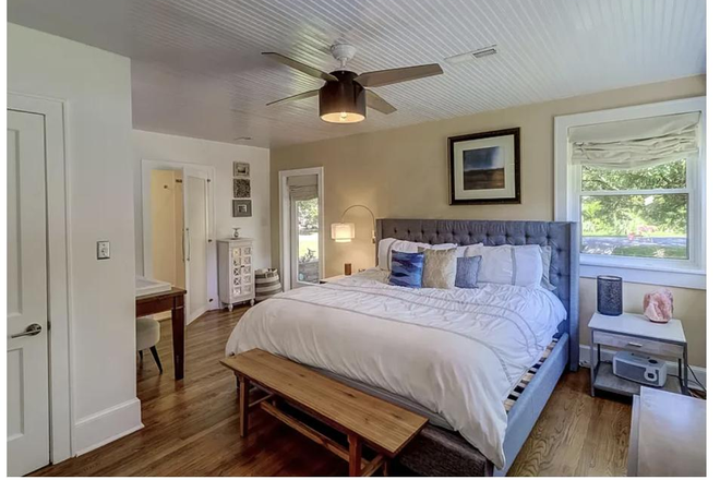 main badroom - Stylish home, freshly painted with new AC, walk to Whole Foods & Harris Teeter, large private lot.