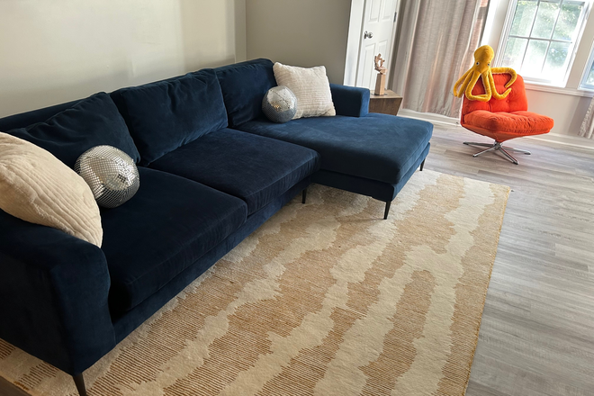 Living room - Updated Condo Near NC State with Pool - $800 All-In