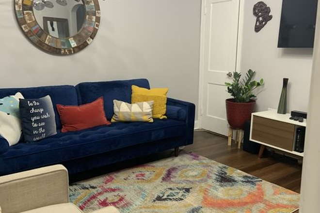 Living Room - All Utilities Included, 10Min walk from Red Line, 25% off 1 month rent w/ 12mo lease signing. Townhome
