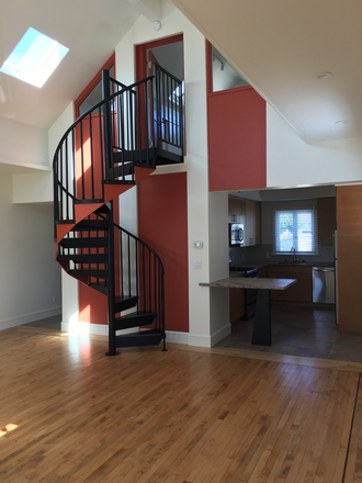 main space looking into kitchen and stair to bedroom - Light-filled spacious quiet 1Bedrm Sunny Loft  in small charming complex. InHouse washer/dryer,decks