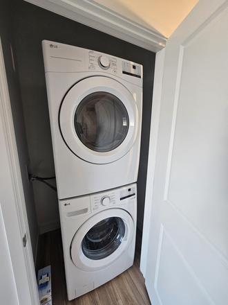 In-unit laundry - Oasis Apartment