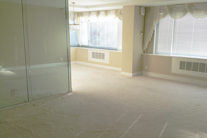 Living and Dining Areas - Spacious Three Bedroom Two Bath Corner Unit Near AU