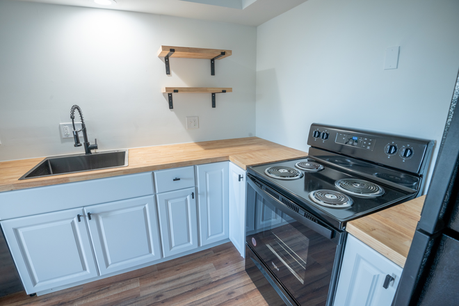 Kitchen - Modern Studio Steps from UC – Available Now! Apartments