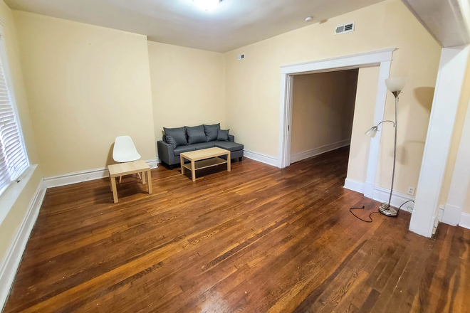 Living Room - 6011 Waterman Blvd, Apartments Unit 1