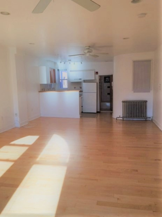 living room - quiet, updated and centrally located 1 bedroom or studio close to campus Apartments