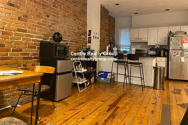 LIVING - LOCATION! 3 BED/2 BATH WITH HEAT AND HOT WATER INCLUDED! ONLY HALF BROKER FEE! 9/1/26!