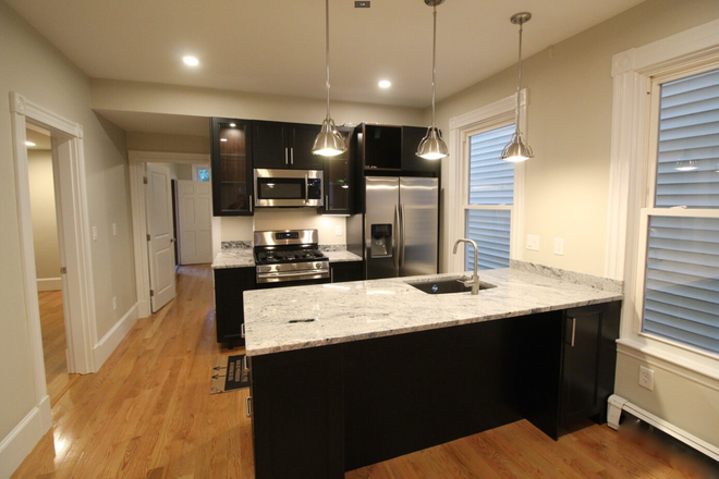 Call NOW for showings! 617-236-8600 - PRINCETON ST - *9/1/2025* MODERN 4BR NEAR AIRPORT MBTA W/ 2 BATH, DECK, SHARED YARD, LNDRY IN BLDNG!