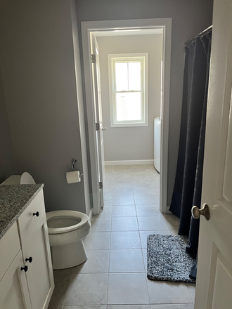 Bathroom and laundry room - New townhome 5.2 miles from UVM campus