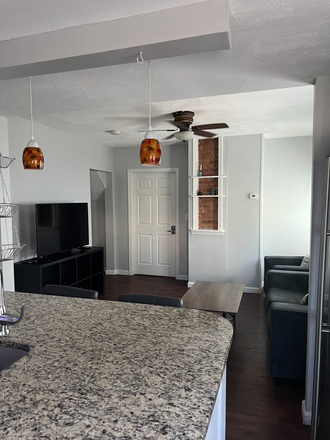 Open Living Room/ Kitchen area - Weymouth Landing, Easy Commute to Boston, Upbeat Safe Neighborhood Apartments