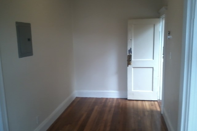 Visit hubrealtyproperties.com - Large one bedroom with front view and deck, in Brighton Apartments