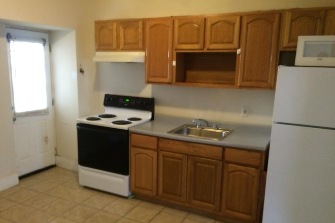 kitchen - One bedroom on a quiet tree lined street Apartments