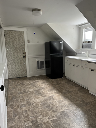 Entrance door to the apartment into the Kitchen - Apartment with One Bedroom in quiet owner-occupied house, 3rd Floor, with private covered porch.