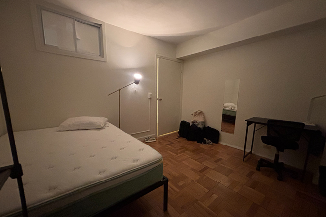 bed, lamp, desk - Bedroom in Stuytown Apartments