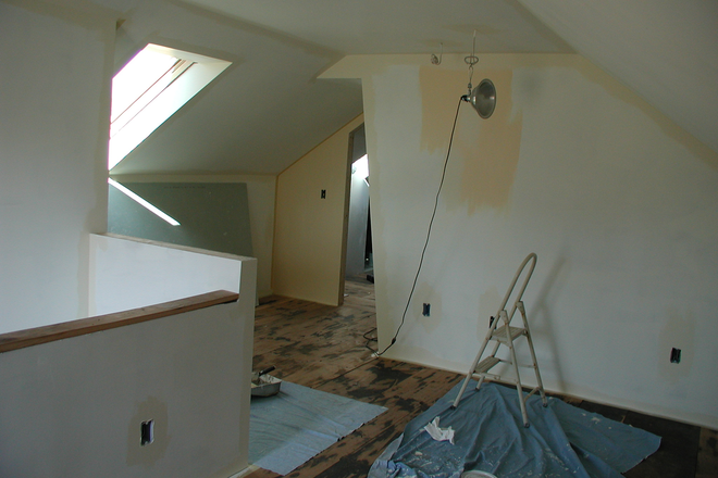 Living room looking towards the bedroom door during 2002 renovations. - Small apartment on Silverbrook Farm. Country living, 5 minutes from campus.  No utility charges.