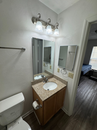 Bathroom - Collegiate Suites Apartments