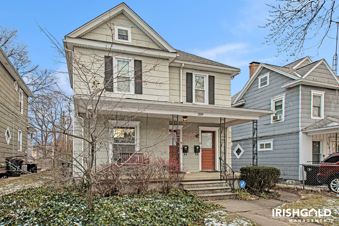 Front - 209 E Navarre St Up - Fully Furnished! Apartments