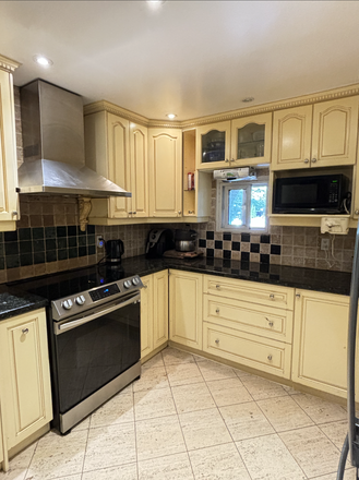 Kitchen - Sunny 4-Bedroom Home with 1.5 Baths, 10-Minute Walk to U of T