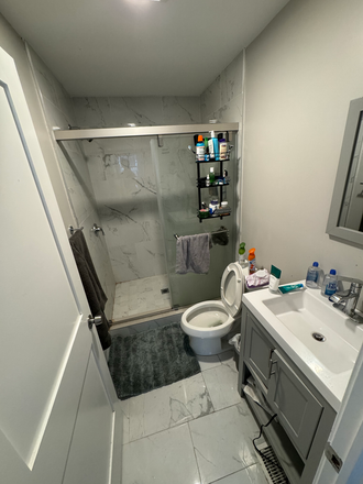 one of the bathrooms - Newly Renovated/pleasant view Apartment Room