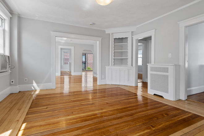 Living Area - STUNNING 7 Bedroom w/ parking, multiple porches & huge unfinished basement! Apartments