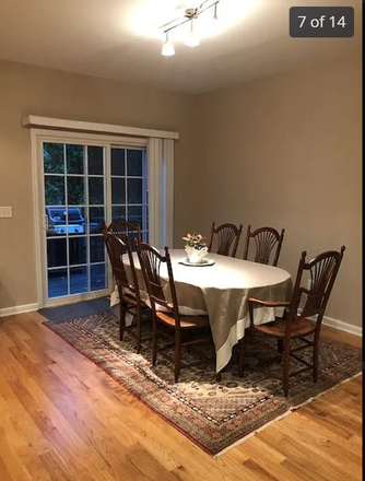 Dining with door to back deck - Fantastic Location Near 5th Street Station! Townhome