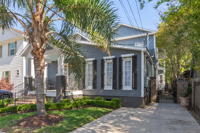Front of house and driveway. - 5527 Willow Street Main House- Bonus AC shed with hardwood floor!