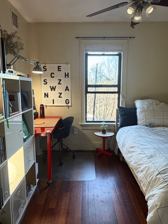 Room during day - Bright, cozy, and modern room close to campus! In-unit washer/dryer, central AC, and balcony!