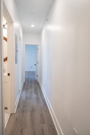 Hallway Apt 1 - NEWLY RENOVATED PROPERTY WITH TONS OF AMENITIES Triplex