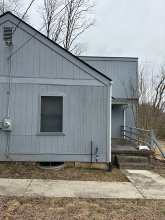 Outside view. Wooded lot. Parking on property - 303A & B Ellett Road