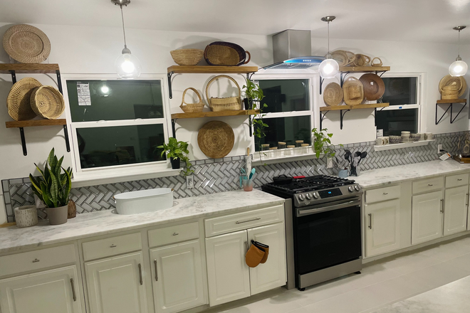 Kitchen with Marble Countertop - Queensborough Subdivision House