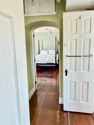 Primary Bedroom from upstairs hall - 125 Church Street Apartments