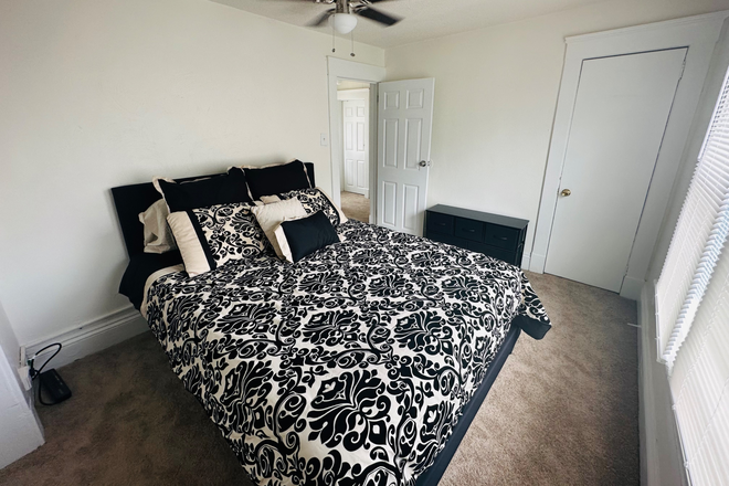 Room 2- queen bedroom - Big Blue 4 bed, 2 bath, furnished house. Utilities included