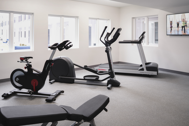 Fitness Center - StayAPT Suites THE Apartment Style - All Utilities Included