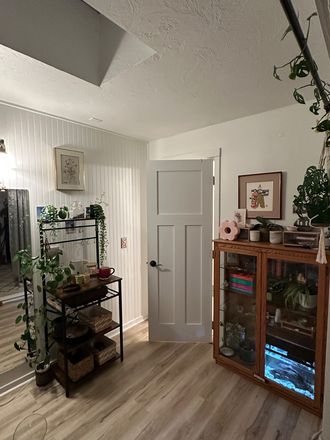 door to bathroom. shared shower and toilet. personal sink - Sunshine Chambers on Chambers Street