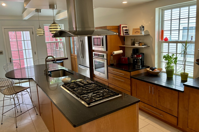High-end Wolf gas cooktop - Charming historic home completely renovated with a modern, open interior