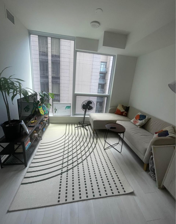 Living room - Spacious Den with Closet & Private Bath in 2 Bed, 2 Bath Condo