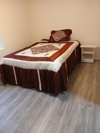 bedroom with night stand and chest of drawers - Room for Rent in a house very close to MSU campus