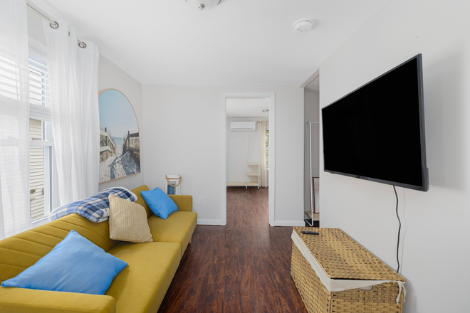 Unit One Living Room - $1800 Per Month Available 26 Second Semester and 26-27 Academic Year,  Stroll to Scarborough! Duplex