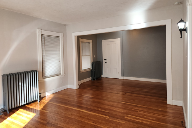 Living room - Commuters: Spacious 1,100 sq ft 2BR Great Quincy location - 5 Min Walk to Red Line - Heat included Apartments