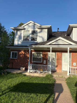Front of house - Duplex on hill, right next to campus.