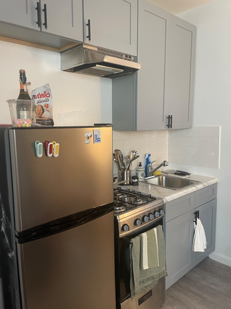 Kitchen - Bedroom in top-floor duplex with private patio! Apartments