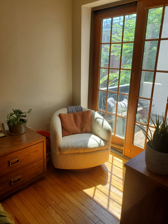 Cozy reading nook next to outside deck - Bright Renovated 2BR w/ Private Deck!