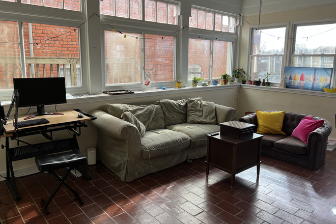 Familyroom - 1105 W. Franklin - Apt #6 Penthouse- Colonial charm with modern amenities