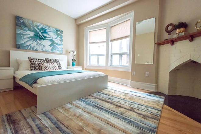 master bedroom - $1300/mo single furnished room for sublease, May 1st- August 31st, 694 Bathurst St, Downtown Toronto