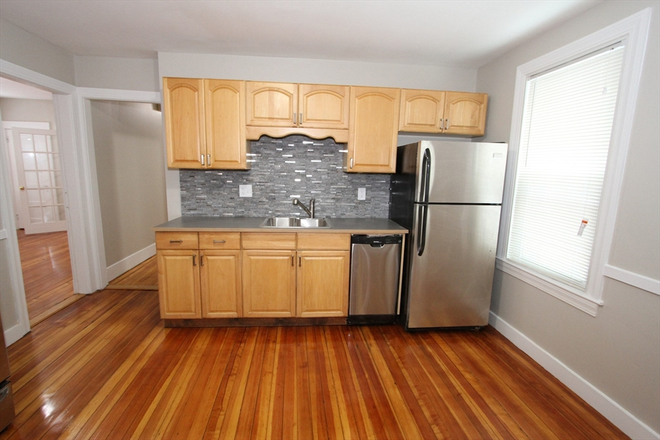 living - SPACIOUS 3 BED IN UPHAM'S CORNER WITH IN-UNIT LAUNDRY, AVAIL 9/1/26!
