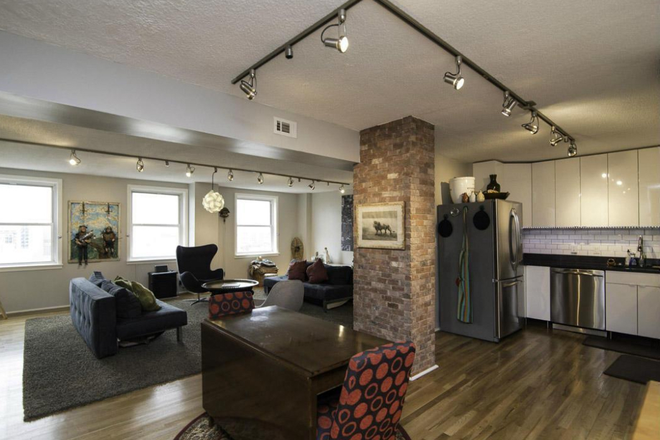 Living room on the left and kitchen on the right - $1100 monthly rent, seeking roommate for 2-bedrooms/2-bathrooms Saint Paul condo in Mount Vernon!