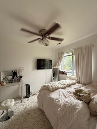 Bedroom (angle from far wall, TV) - Stunning bedroom with Flatiron views, 2 minute walk from campus. Duplex