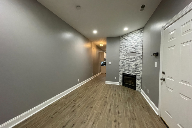 Living Room - Charming 1BR / 1.5BA Apartment in Historic Reservoir Hill